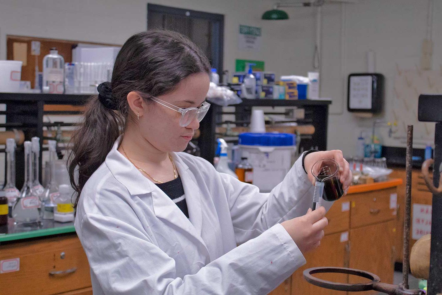 Science Student Conducting Research